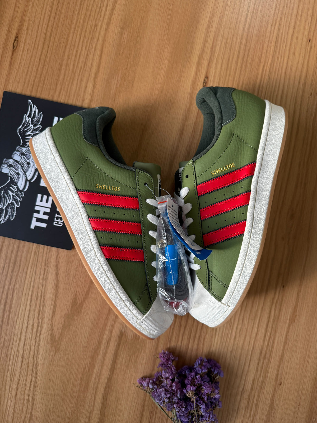 adidas super star in green ninja