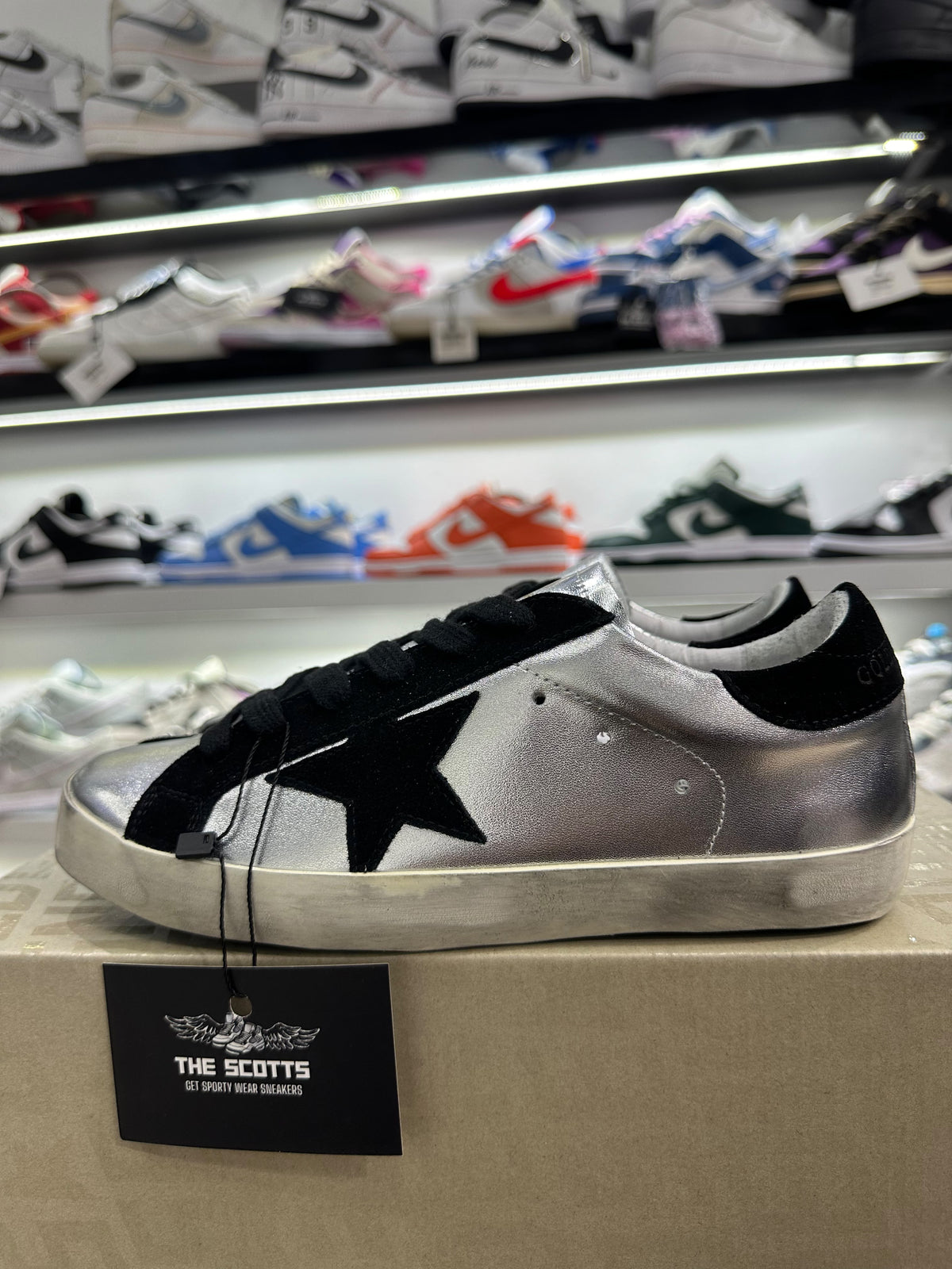 Golden Goose Super-Star trainers in silver leather