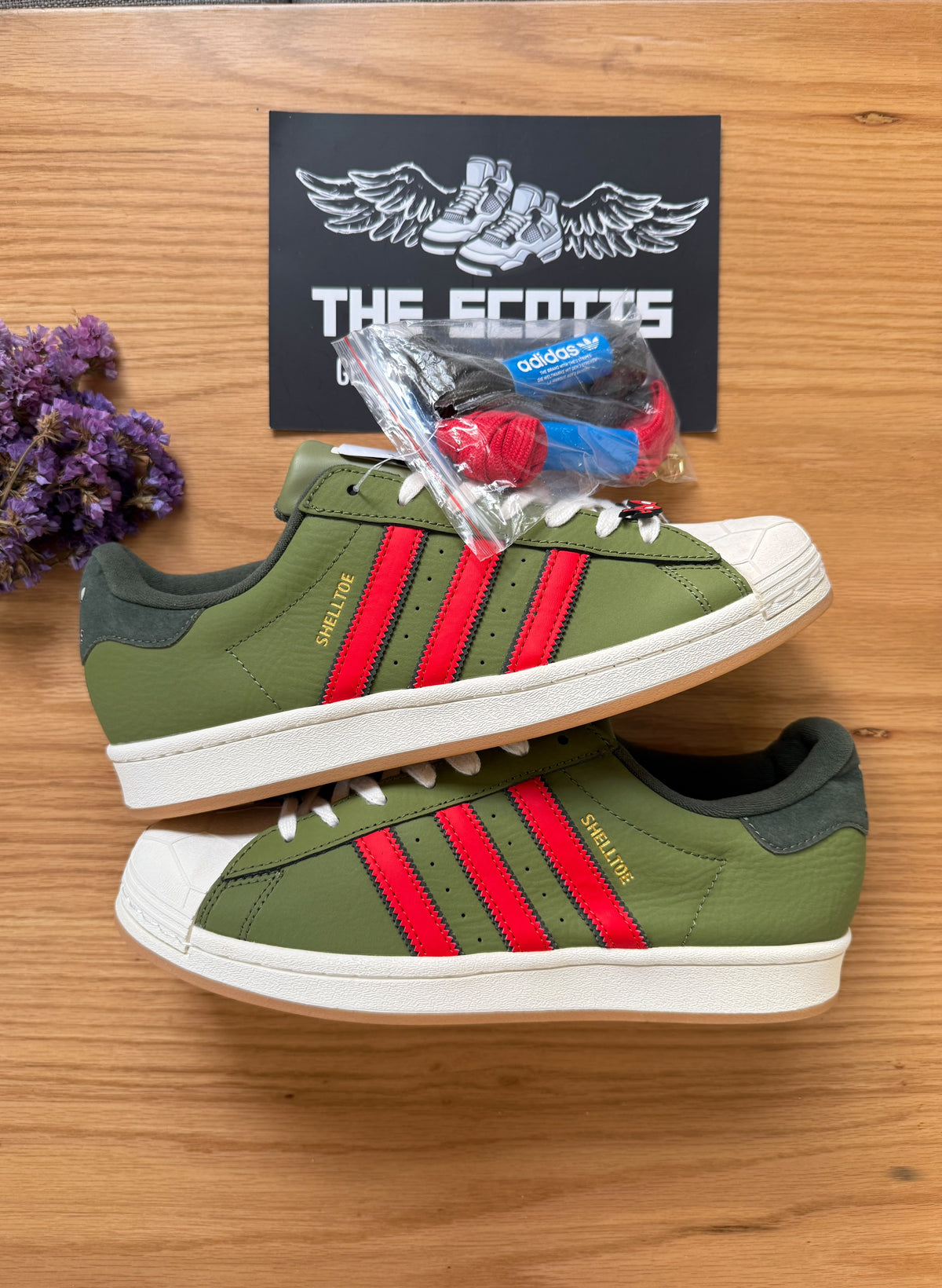 adidas super star in green ninja