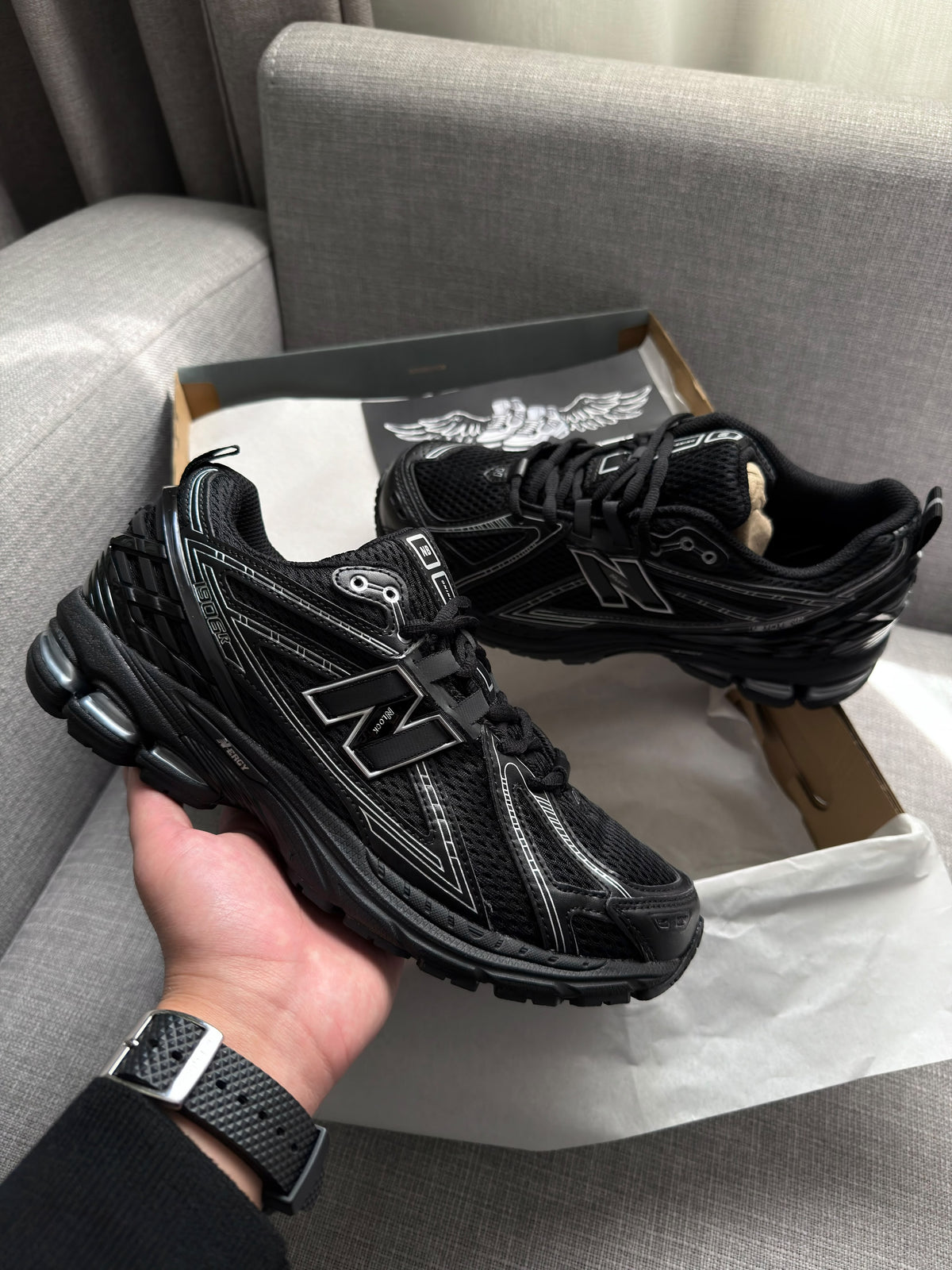 New Balance 1906R in a black and silver/grey