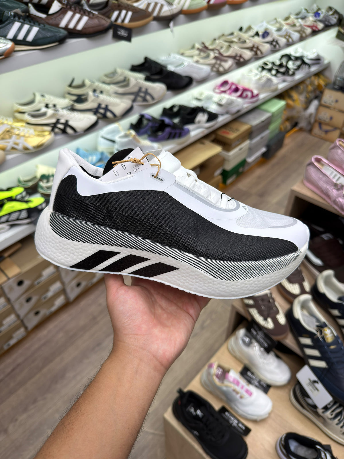 adidas Hyperboost Edge running shoe in a white and black